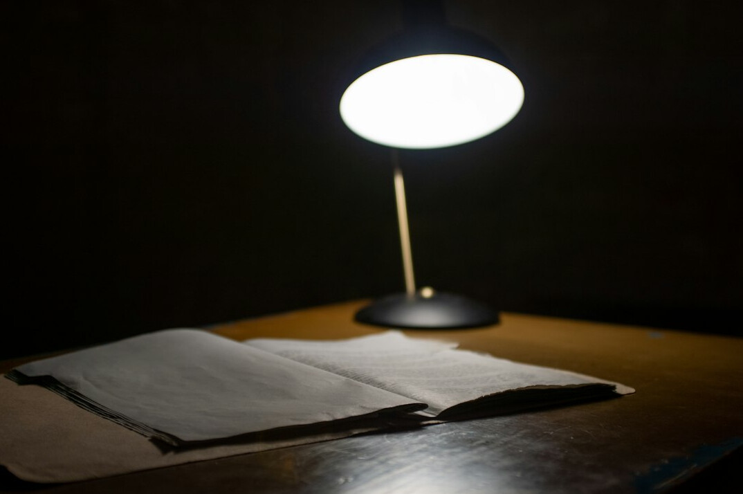 mystery novel open on table