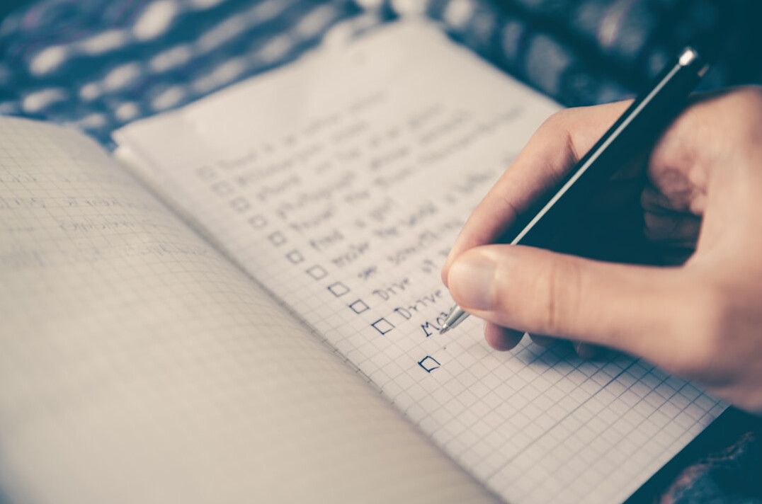 person writing notes